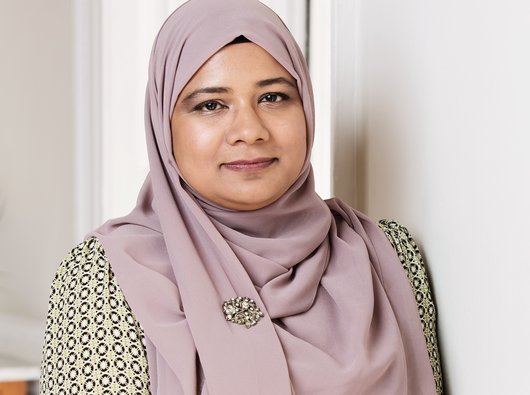 Rubina, (a staff member at Blood Cancer UK's headshot), smiling.