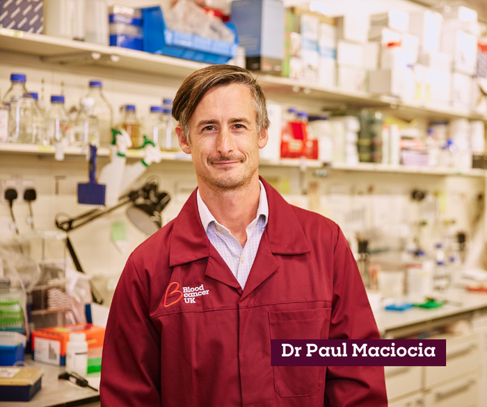 Dr Paul Maciocia stood in the lab smiling