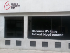 The exterior of the the old Blood Cancer UK office at Eagle Street. The exterior of the building has the writing "Because it's time to beat blood cancer".