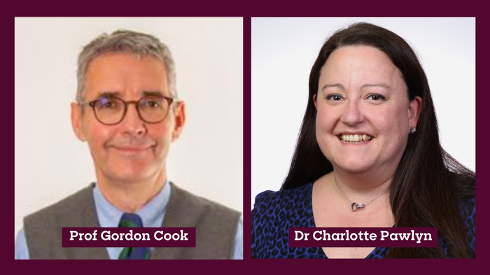 Headshots of a man and woman side by side smiling. The man has grey hair and glasses and the woman brown hair.