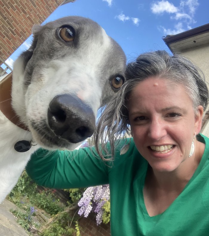 Esther, who is living with essential thrombocythaemia (ET), with her dog