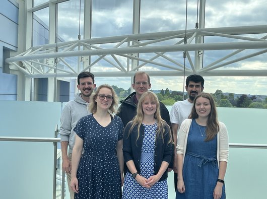 Lab group smiling at camera