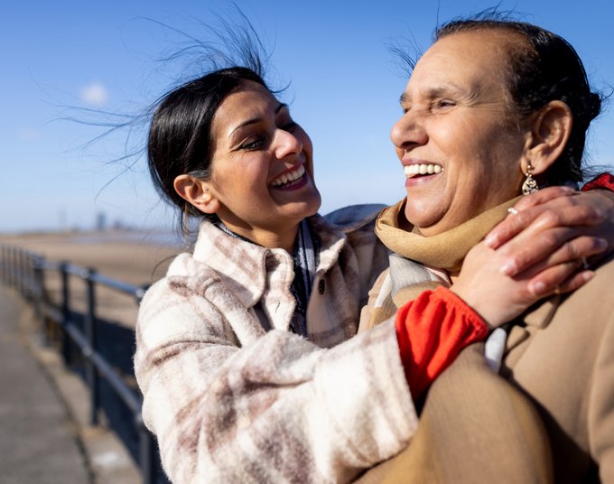 Image of two ladies hugging