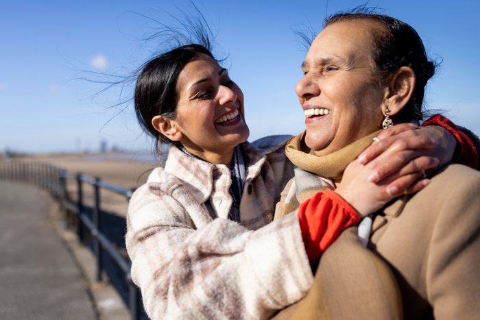 Image of two ladies hugging