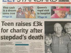 Photo of the Ely Standard with the headline 'Teen raises £3K for charity after stepdad's death' with black and white photo of Jake Moules and his stepdad.