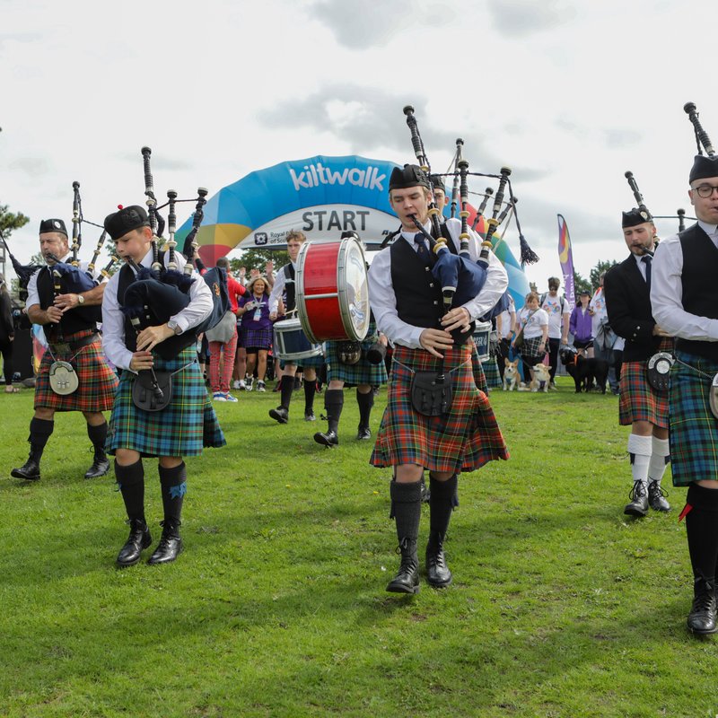 Dozens of people wearing Kilts and taking part in the Kiltwalk event.
