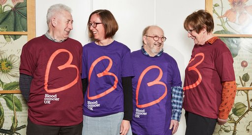 Two men and two women wearing Blood Cancer UK t-shirts