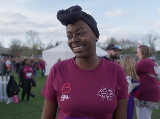 Nadine at Walk of Light Birmingham 2024 wearing Blood Cancer UK Walk of Light branded t shirt