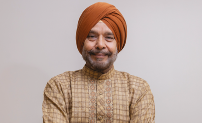 An image of the front cover of our Polish flyer. On the front cover, there is a photo of a man in traditional Punjabi clothing, looking into the camera with a gentle smile. Below him are some Punjabi words, which mean "Support for you in Punjabi"