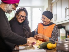 A family preparing a meal together