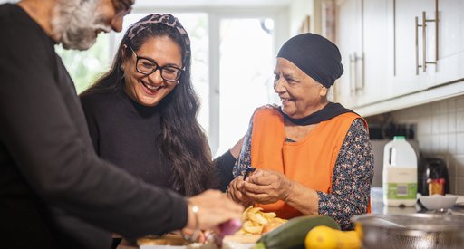 A family preparing a meal together