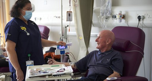 Nurse with a patient having treatment