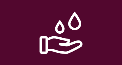 A simple graphic of an upturned hand catching two drops of water.