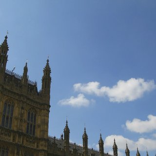 Houses of Parliament taken from a low angle, looking up at the building.