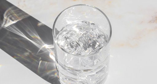 Glass of water with ice cubes